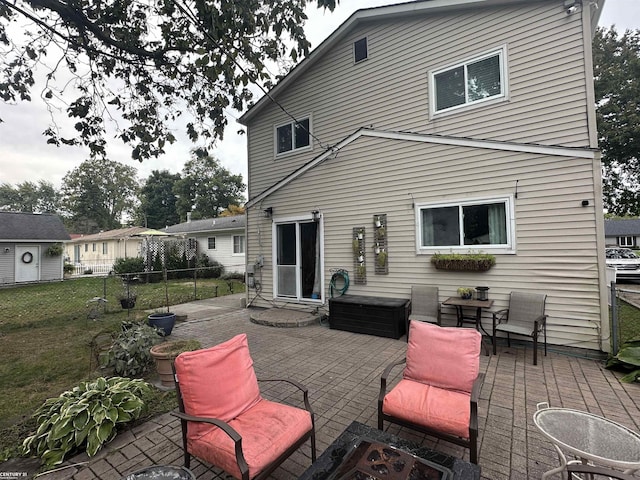 rear view of house featuring a patio area