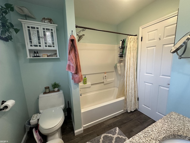 bathroom with shower / bath combo and toilet