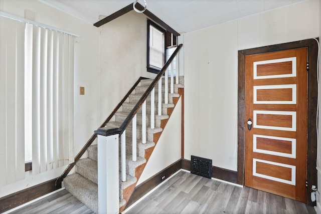 entryway featuring hardwood / wood-style flooring