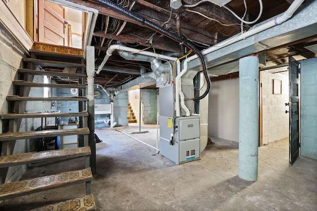 basement featuring heating unit