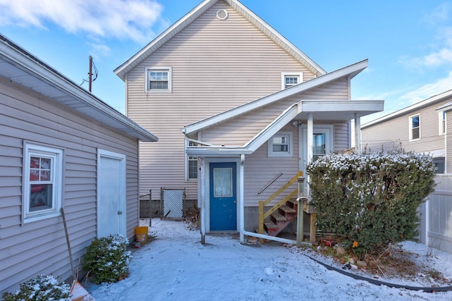 view of snow covered property