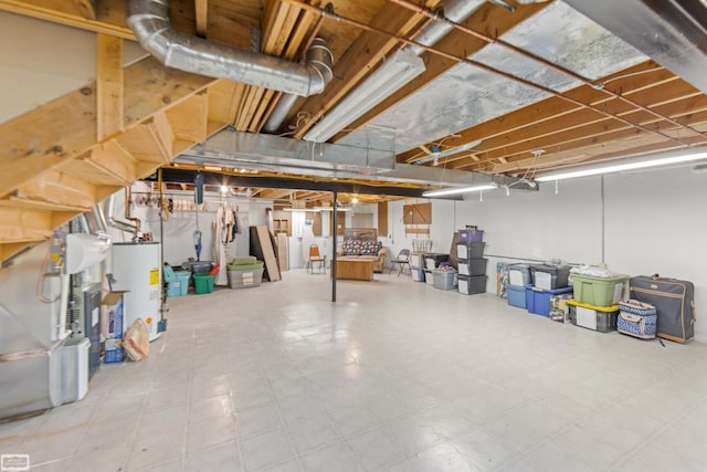 basement with heating unit and water heater