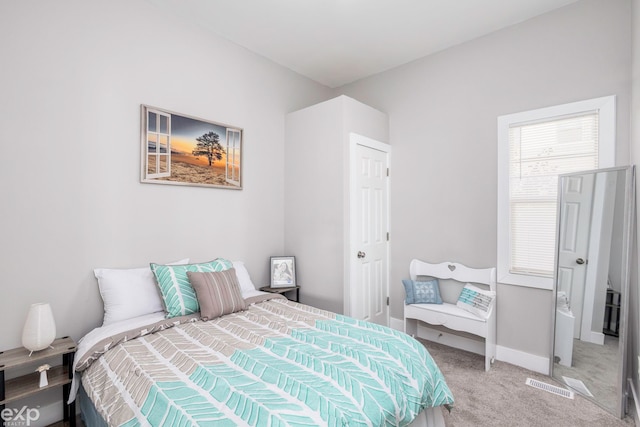 bedroom featuring carpet