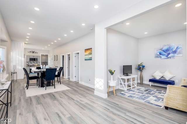 dining space featuring light wood-type flooring