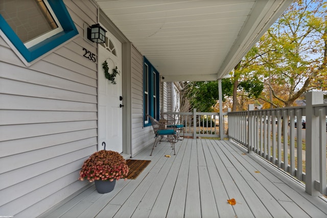 wooden deck with a porch