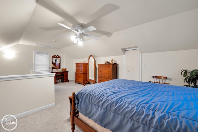 bedroom featuring light carpet, vaulted ceiling, and ceiling fan