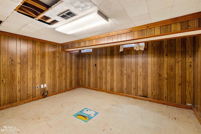 basement with wood walls