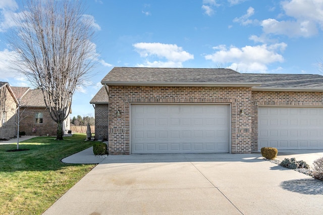 garage featuring a yard