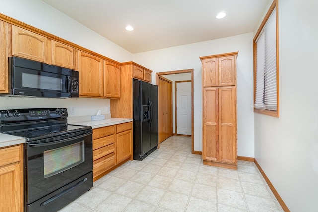 kitchen with black appliances