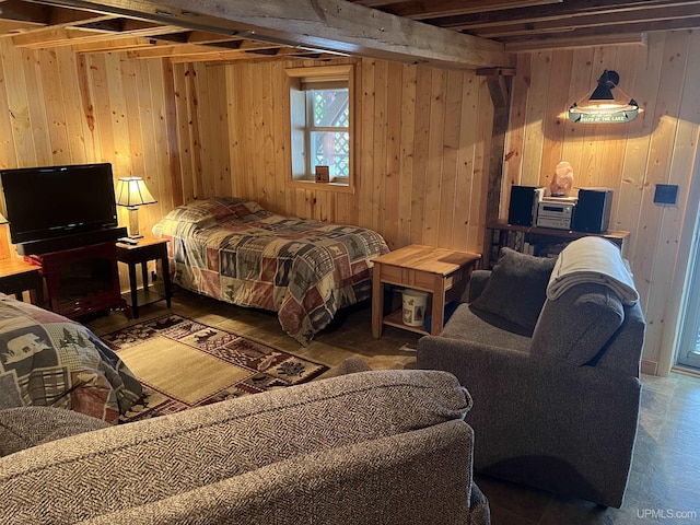 bedroom with wooden walls and beamed ceiling