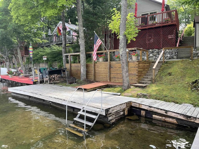 dock area with a water view