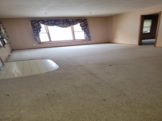 spare room with carpet flooring