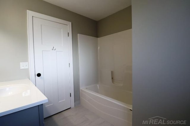 bathroom with vanity and tub / shower combination