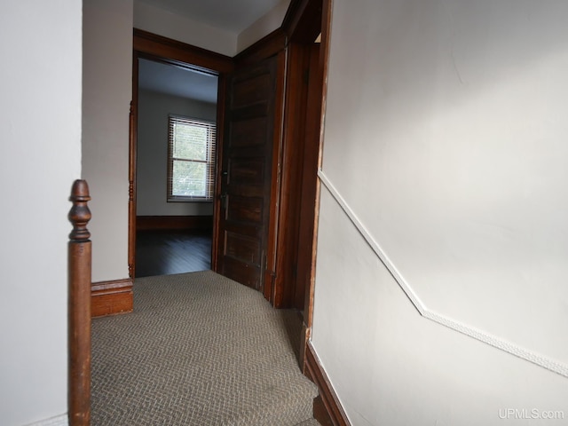 corridor with carpet floors