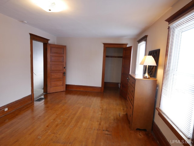 unfurnished bedroom featuring light hardwood / wood-style flooring