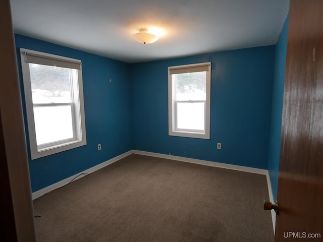 view of carpeted spare room