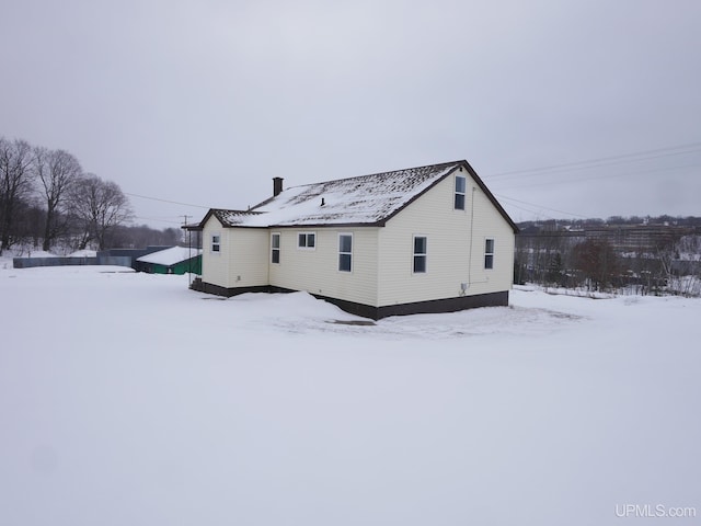 view of snow covered property