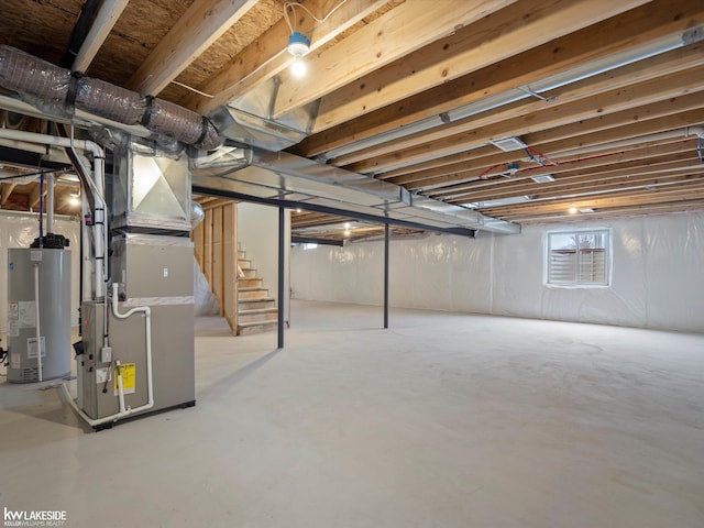 basement with heating unit and water heater