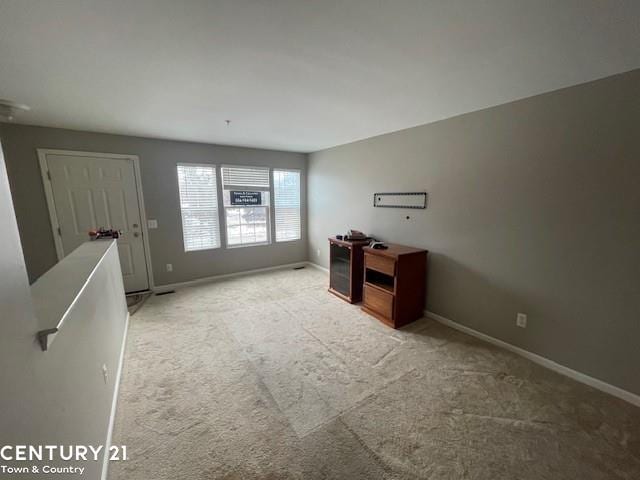 empty room featuring carpet flooring