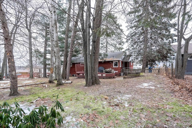 view of yard with a wooden deck