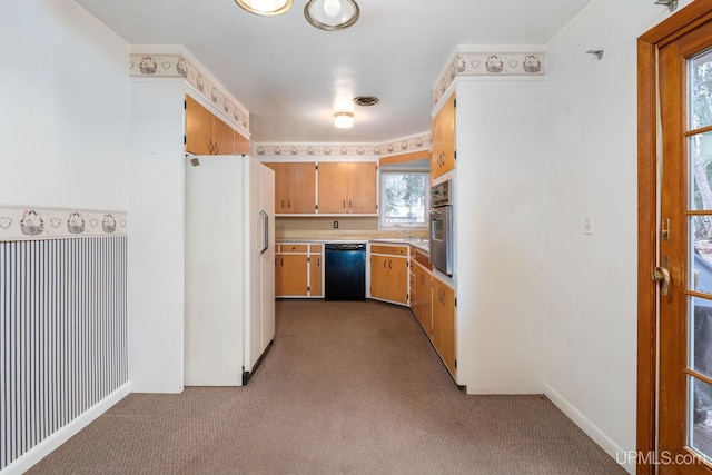 kitchen featuring stainless steel oven, white refrigerator with ice dispenser, sink, black dishwasher, and light colored carpet