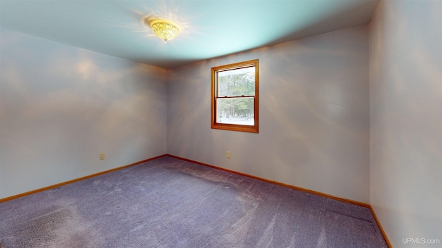 unfurnished room featuring carpet floors