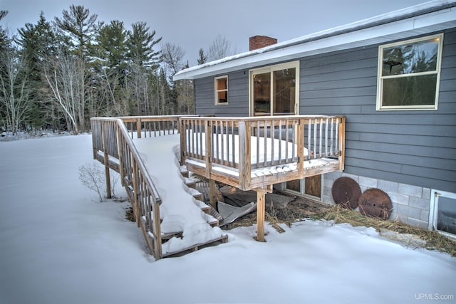 view of snow covered deck