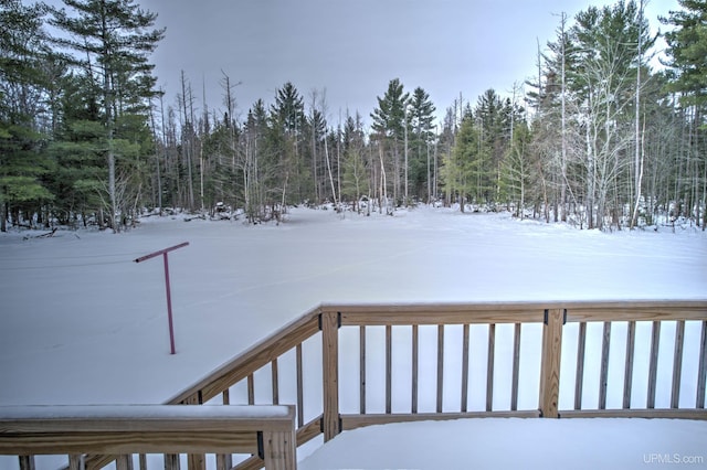 view of snow covered deck