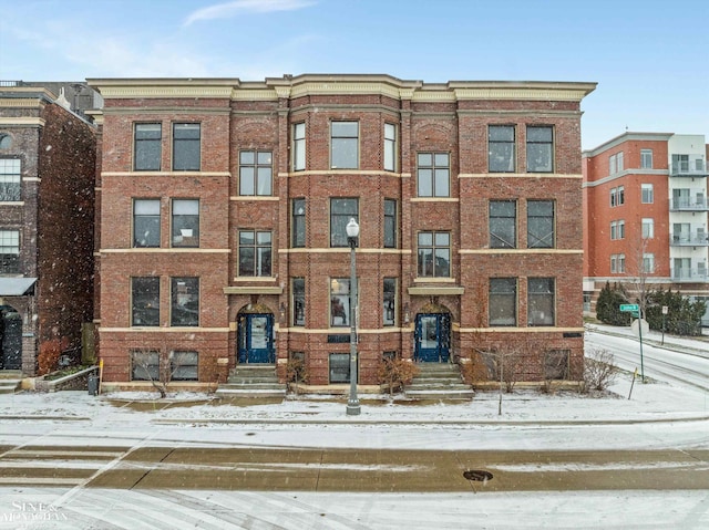 view of snow covered property