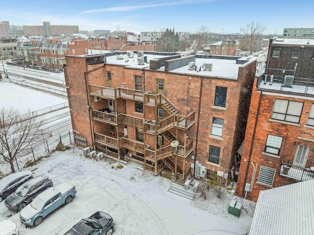 view of snow covered property