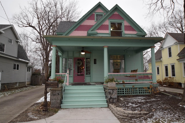 victorian house featuring a porch