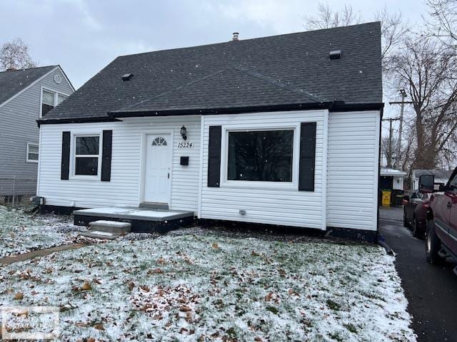 view of snow covered house