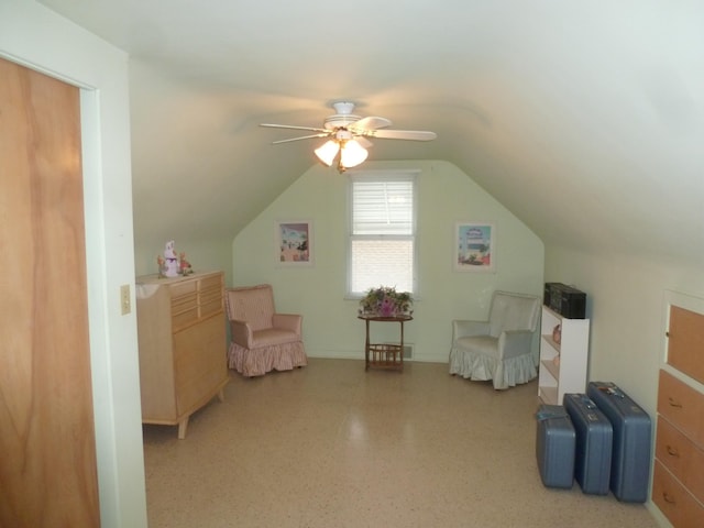 additional living space featuring ceiling fan and lofted ceiling