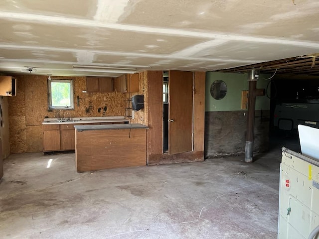 kitchen with wood walls