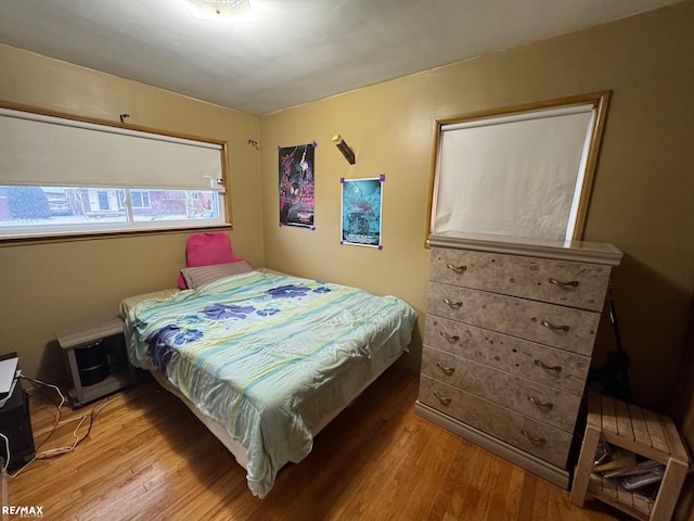 bedroom featuring light hardwood / wood-style flooring