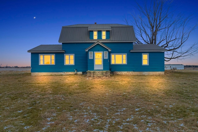 view of front of home featuring a yard