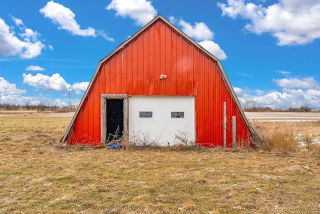 view of outdoor structure featuring a rural view