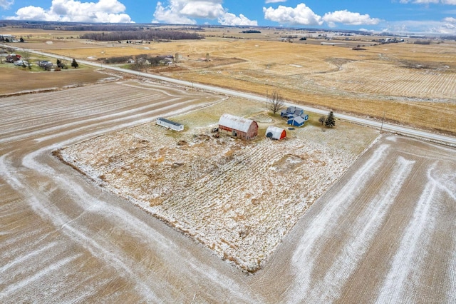 birds eye view of property featuring a rural view