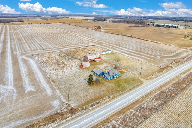 birds eye view of property featuring a rural view