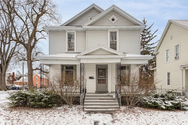 front of property featuring covered porch