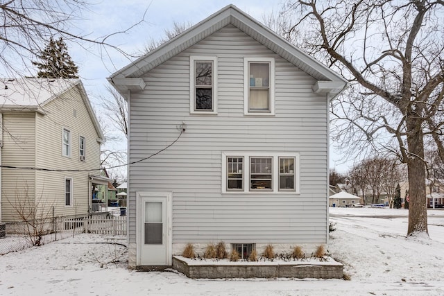 view of snow covered property