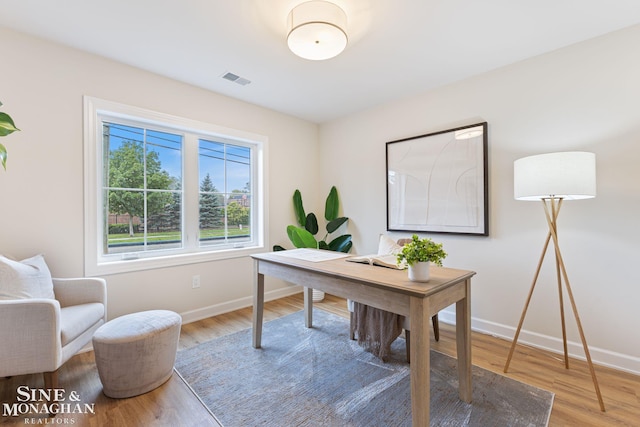 home office featuring hardwood / wood-style flooring