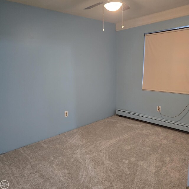 30442 Utica Rd, Roseville, MI 48066 - carpeted empty room featuring ceiling fan and a baseboard heating unit