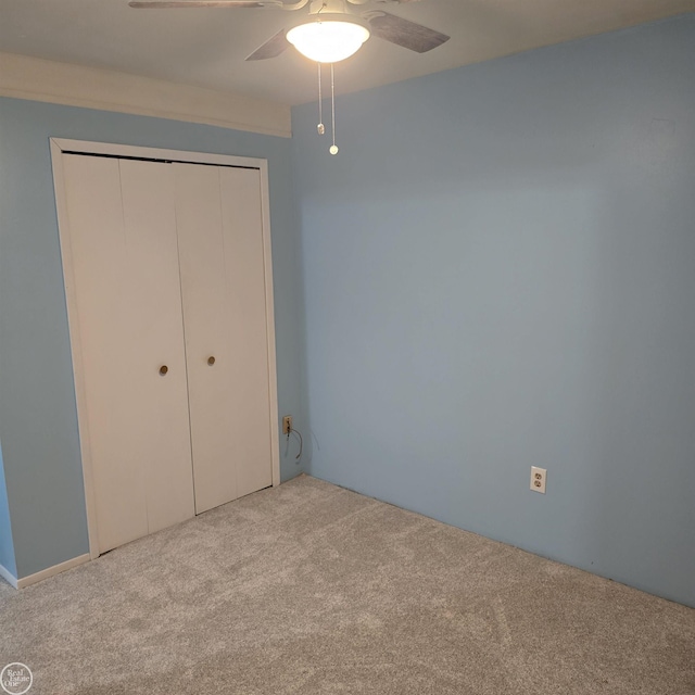 30442 Utica Rd, Roseville, MI 48066 - unfurnished bedroom with light carpet, a closet, and ceiling fan