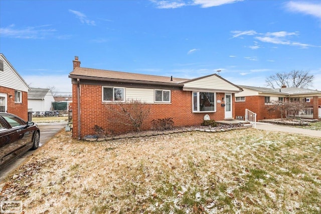 single story home with a front yard