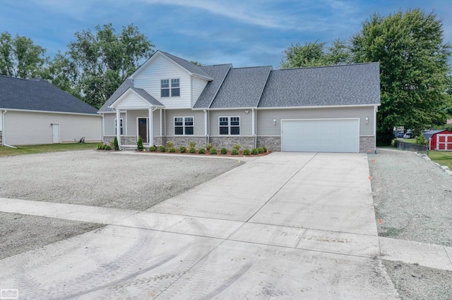 view of front of property with a garage