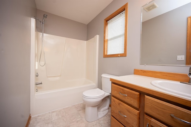 full bathroom featuring vanity, shower / bath combination, and toilet