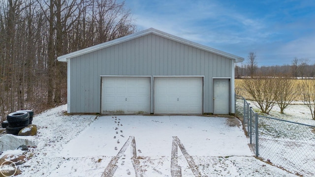 view of snow covered garage