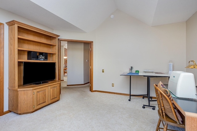 office featuring light colored carpet and lofted ceiling