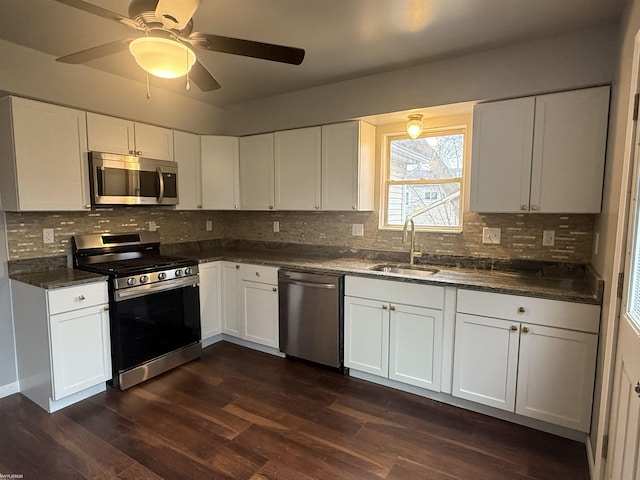 kitchen featuring white cabinets, sink, and stainless steel appliances